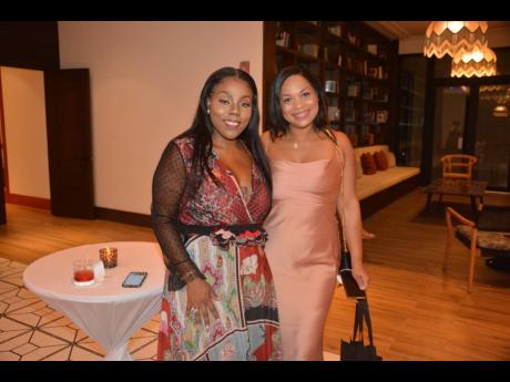 Keanna Sanders (left), chief executive officer, Sanbridge Early Learning Centers, and Kheri-Ann Yong, director of operations at premium cigar manufacturing company Fire Lyfe, at a cocktail reception at the Ocean Coral Spring in Trelawny.