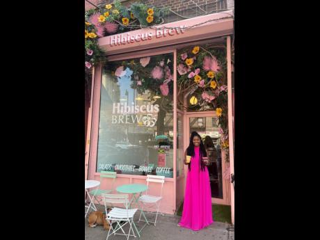 Allison Dunn in front of her colourful Hibiscus Brew café in Brooklyn, New York. 