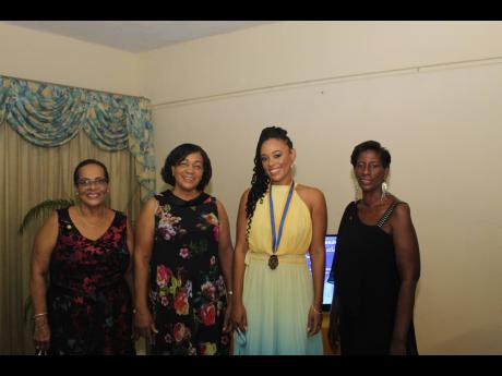 Incumbent Dr Kimberly Freeman (second right) with former women presidents of the Rotary Club of Mandeville (from left), Dale Greaves Smith, Pauline Channer, and Karleen Kelly Reid.