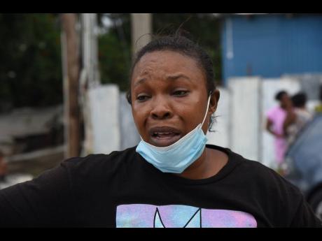 Keron Marshall, mother of Kevon Morgan, who was allegedly shot and killed by a solider in Homestead, Spanish Town, on Thursday.