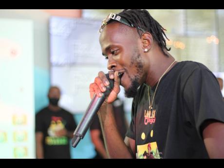 Laa Lee performs at the Digicel Ocean Boulevard Headquarters last Wednesday for the official launch of the telecommunications company’s ‘Mek Wi Rich Togeddah’ summer promotion.