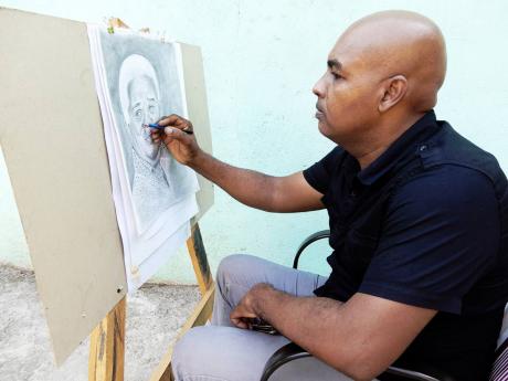 O’Neil Duckie at work on a sketch of Volier Johnson, the Jamaican actor who died more than a week ago.