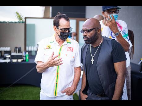 Joe Bogdanovich, Reggae Sumfest executive producer and chairman and CEO of Downsound Entertainment, is caught deep in conversation with veteran reggae artiste Richie Stephens as they participate in The Bridge 99 FM launch broadcast at the AC Marriott Kings