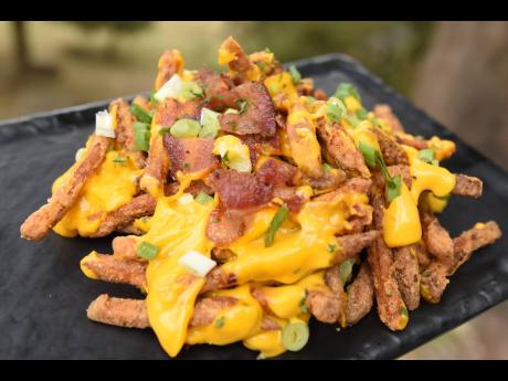 Keep your taste buds locked and loaded with these loaded fries. 