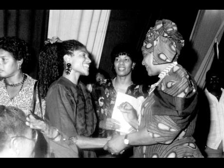 Singer Carlene Davis (left), one of the most powerful local singers in the fight for liberty for black South Africans, was singled out for special meeting by Winnie Mandela (right) on her visit to Jamaica with her husband Nelson Mandela. Davis’s two song