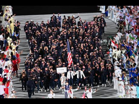 United States of America athletes participate in the athletes parade during the opening ceremony of the Tokyo 2020 Olympics held at the Olympic Stadium in Tokyo, Japan on Friday, July 23, 2021