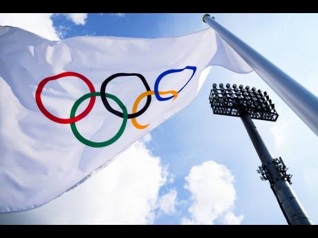A flag bearing the Olympic Rings.