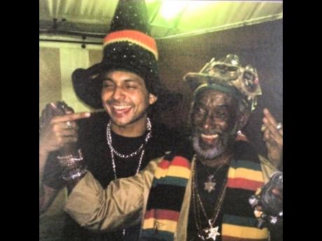 Sean Paul (left) and legendary record producer Lee ‘Scratch’ Perry. Sean Paul recounted the story of how Scratch Perry gave him a crystal in 2005 that he now wears as a pendant. 