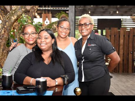 From Left: Chrystal Harewood, Kymone Booth, Annalise Harewood and Michelle Watkis-Robinson celebrate the launch of Janga’s Appleton Estate Lyric Lounge.