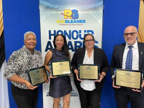 From left: Winsome Wilkins, chief executive officer of the United Way of Jamaica; Caron Chung,executive director of the American Friends of Jamaica; Saffrey Brown, chairperson of the Council of Voluntary Social Services  and Keith Duncan, president of the 