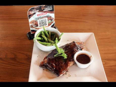 Plantation Smokehouse invites all pork lovers to pass by, get cosy and put their money where their mouths are with an order or two of its prize-winning ribs glazed with barbecue sauce.