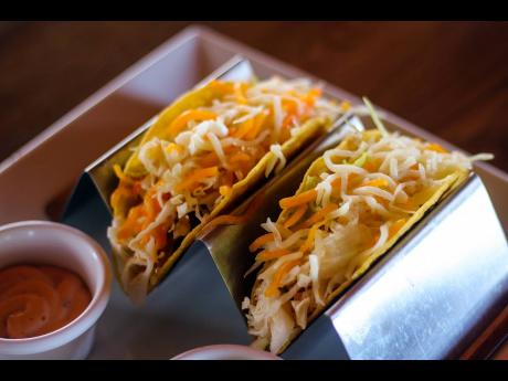 A tender white fish fillet resting in-between a hard-shell taco, cabbage, onions and a blend of a variety of cheeses, then passed through the oven gives the stomach that warm, satisfied feeling.