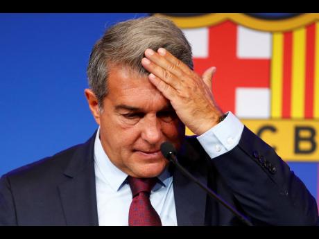 FC Barcelona club President Joan Laporta reacts during a news conference in Barcelona, Spain.