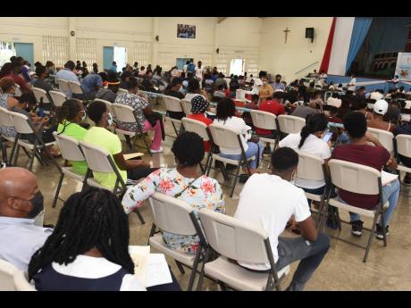 Kenyon Hemans/Photographer 
above: On Saturday, the Government launched a four-day islandwide COVID-19 vaccination blitz targeting children 12 years and older with comorbidities. Students, aged 15-18 years who will be sitting exit exams, will also be prior