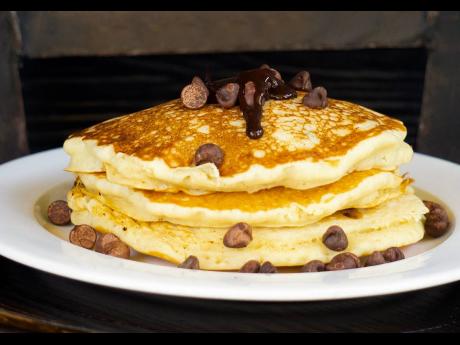 How do you like your pancakes stacked? Mr Breakfast has chocolate chip pancakes that are fluffy and sweetened just right.
