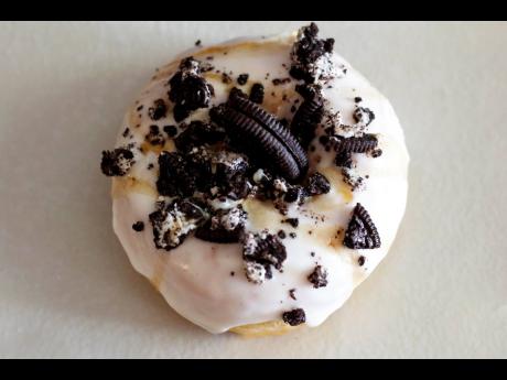 The 
Creamie Cookie doughnut is topped with Oreo cookies and vanilla cream. 