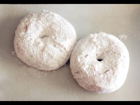  Doughnuts dusted with powdered sugar are a heavenly treat. 
