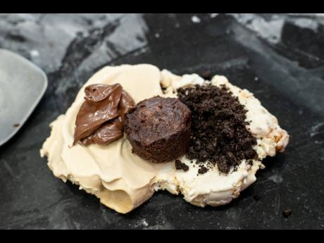 Another signature creation, the Alicia Remix — pralines n cream and coffee ice cream with brownies, Nutella and Oreos.