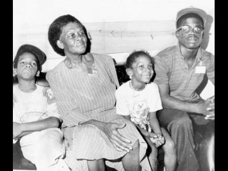 Peter Tosh's mother Alvira Coke (second left), with Tosh's children from left: Jawara (7), Niambe (5) and Horace (21).