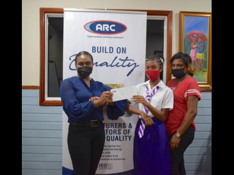 Dupont Primary’s top PEP performer is on her way to achieving her dreams of becoming a dentist following ARC Manufacturing’s contribution to offset tuition and book expenses for the new academic year. Lakaica Greenland (centre) was joined by her mother