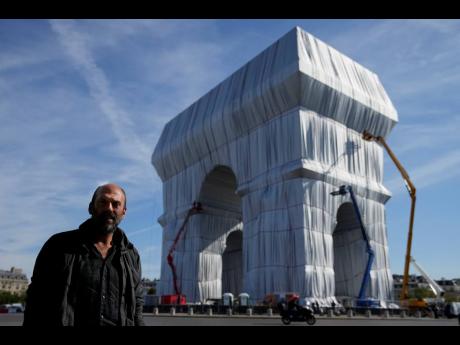 Vladimir Yavachev, a nephew of late artist Christo, who leads the ‘L’Arc de Triomphe, Wrapped’ project, poses near the Arc de Triomphe monument.