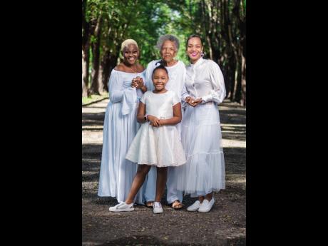 
Dr Terri-Karelle Reid considers herself extremely lucky to be part of a four-generation family that is female and that has simultaneously inspired and kept her grounded. From left: Mother, Donna; grandmother, Jeanie; and Terri-Karelle. Front: Daughter, Na