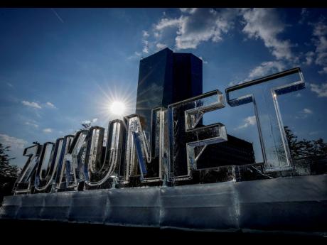 AP
Letters of melting ice reading ‘Zukunft’ or ‘Future’ was set up by Greenpeace activists in front of the European Central Bank in Frankfurt, Germany, on Thursday, September 9. 