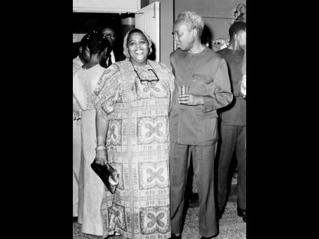 The Honourable Louise Bennett-Coverley, OJ, conversing with President Julius K. Nyerere of Tanzania at the Little Theatre where a performance by the National Dance Theatre Company was staged in his honour. 
