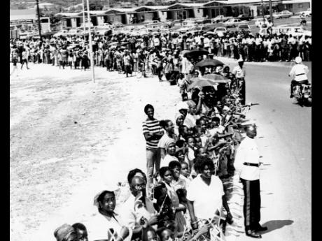 A section of the large crowd which lined the Harbour View roundabout  on September 14 to greet President Julius K. Nyerere on his arrival in Jamaica for the start of a four-day official visit. 