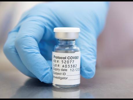 This undated photo issued by the University of Oxford shows of vial of coronavirus vaccine developed by AstraZeneca and Oxford University, in Oxford, England. 