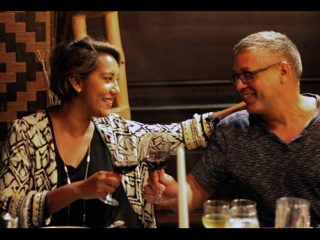 Marketing consultant and Cellar 8 partner Nasma Chin and her husband, Alex Chin, clink their glasses and say cheers to life over refreshing conversation and stimulating wine.