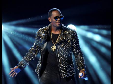 R Kelly performs at the BET Awards at the Nokia Theatre on Sunday, June 30, 2013, in Los Angeles. 