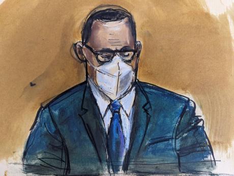 In this courtroom sketch, R Kelly listens as the jury foreperson reads the verdict, on Monday, September 27, 2021, in New York.