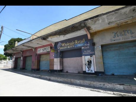 A number of businesses have been shuttered along Windward Road in the crime-plagued Rockfort community in east Kingston. Residents want to see the community incorporated into plans to redevelop downtown Kingston.