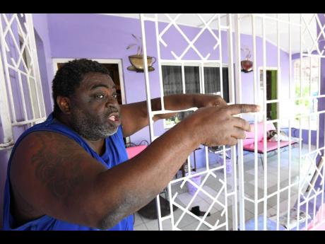 Hugh McKenzie, resident of Woodford Park in southeast St Andrew, complains about power outages in the community. McKenzie said that his daughter has been provided with the resources to work remotely but has had to return to the office because of inconsiste