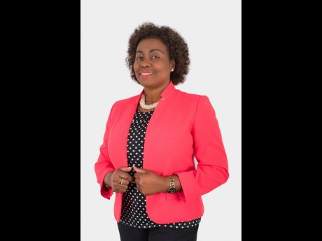 
Gloria Henry, president of the Global Services Association of Jamaica.