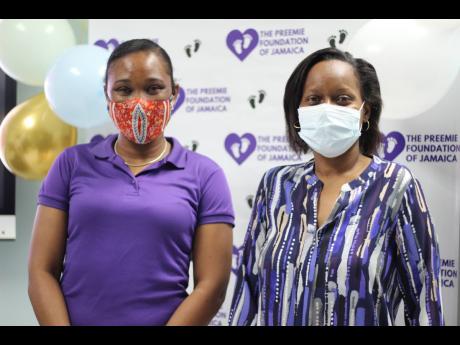 Founder of the Preemie Foundation of Jamaica Serika Sterling (left), shares a frame with Dr Blondell Crosdale during a treat for the staff of the Neonatal Intensive Care Unit at the University Hospital of the West Indies.  