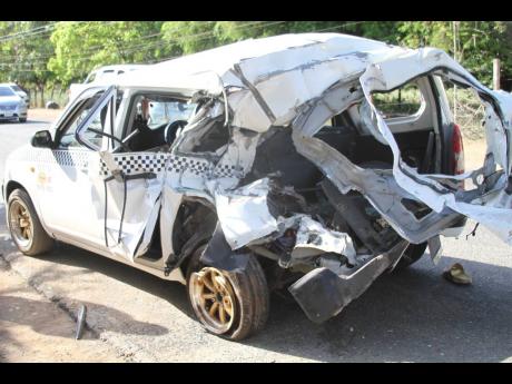 Remains of a car after a fatal accident along the Tollgate main road, Friday, August 6, 2021.