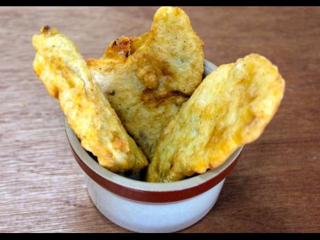 Nothing goes better with porridge than salt fish fritters, fried to perfection.