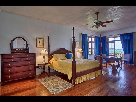 The principal bedroom with its old world charm.