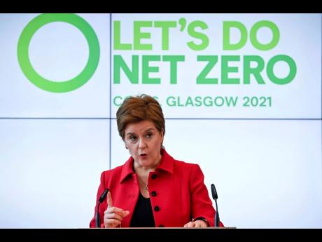 Scotland’s First Minister Nicola Sturgeon delivers a keynote speech in the Technology and Innovation Centre during a visit to the University of Strathclyde, Glasgow, ahead of the United Nations COP26 climate conference.