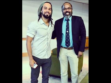 Trinidadian soca artiste Kes (left) with Dr Rene Williamson. 
