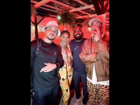 Grammy Award-winning producer Walshy Fire (second right), recording artiste Naomi Cowan (second left); founder of live music events planning company Everyday People DJ Moma and producer Silent Addy are almost caught off-guard when the cameras turned in the