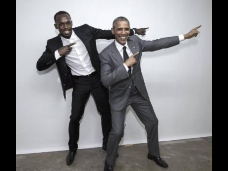 Then President of the United States, Barack Obama, strikes the ‘lightning’ pose with fastest man, Jamaican, Usain Bolt, on his visit to the island in 2015.