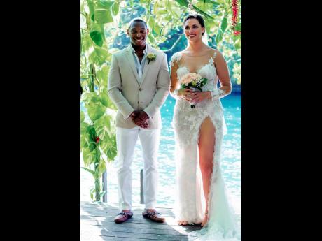 Pierre (left) and Morgan tied the knot on the deck of Port Antonio’s Kanopi House, overlooking the majestic Blue Lagoon. 