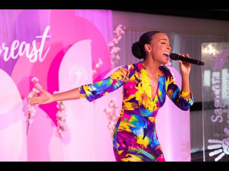 Alaine performs at the Keeping Abreast Concert and Conversation. 