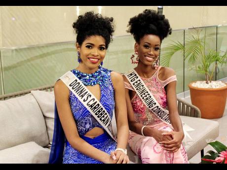 Caught in the middle of a heart-to-heart, Miss Universe Jamaica second runner-up Lauren Less (left) and first runner-up Trishanie Weller.
