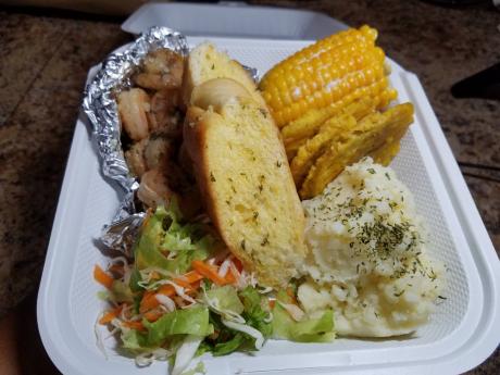 For Jackson’s pop up kitchen, she whipped up grilled shrimp accompanied by an assortment of sides: mashed potatoes, corn on the cob, vegetables, fried green plantain and garlic bread. 