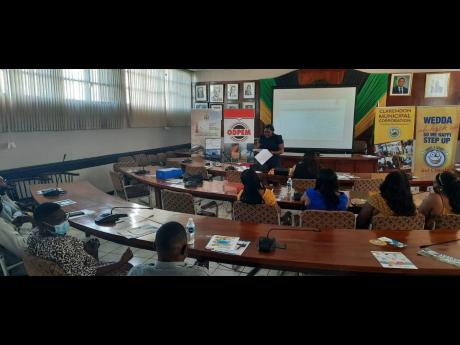 The validation workshop for Mitchell Town’s updated Community Disaster Risk Management Plan underway at the Clarendon Municipal Corporation offices yesterday.
