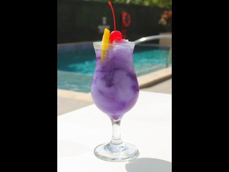 The purple rain is a frozen cocktail made of a mixture of Smirnoff Vodka, Blue Curacao, Grenadine and lime juice.
